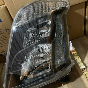 Đèn pha xe Chenglong H7 bên Lái mặt đen